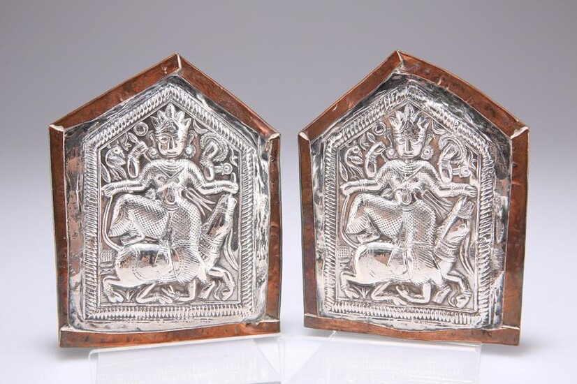 A PAIR OF 19TH CENTURY MIDDLE EASTERN SILVER PLAQUES