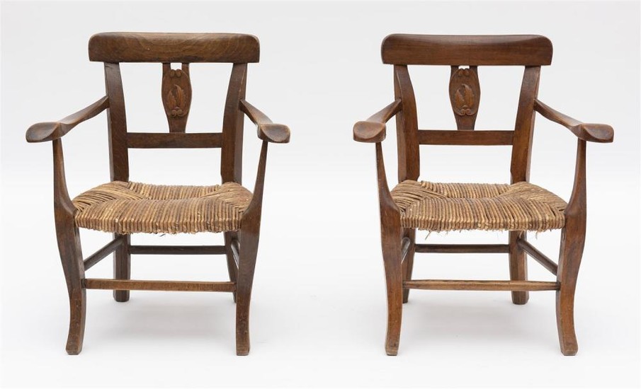 A PAIR OF 19TH CENTURY FRENCH OAK CHILDREN'S CHAIRS WITH RUSH SEATS. SEAT HEIGHT 25CM. SPECIAL NOTE REGARDING COLLECTION: TO BE COLL..