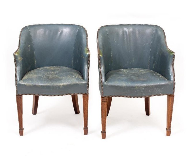 A PAIR OF BLUE LEATHER UPHOLSTERED SIDE CHAIRS with...
