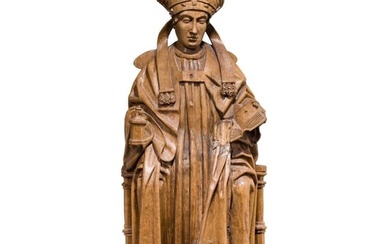 A Rhenish sculpture of a bishop on a throne, 1st half of the 16th century