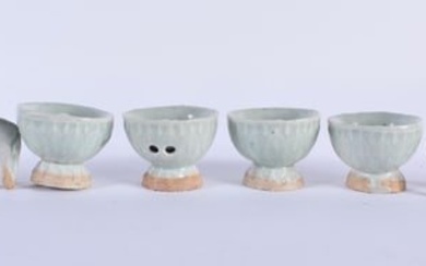 A SET OF FOUR CHINESE QING DYNASTY QINGBAI STONEWARE ANIMALS together with four similar censers. Lar