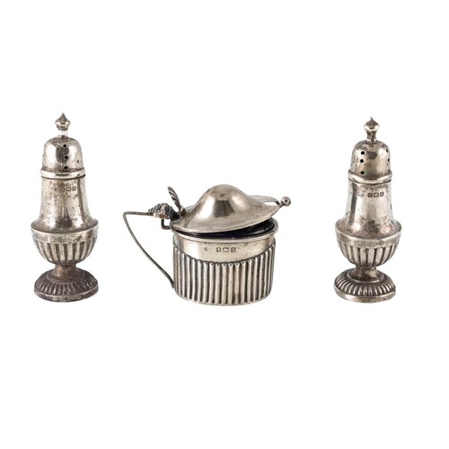 A SET OF THREE GEORGE V SILVER CONDIMENT SET, gadrooned deco...