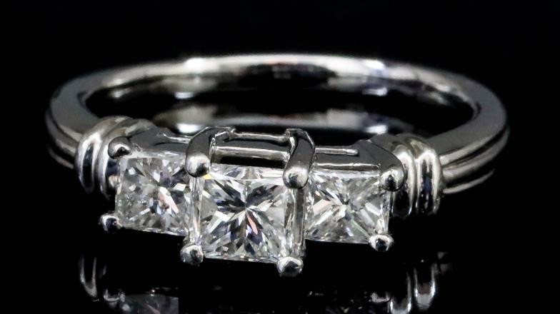 A Three Stone Diamond Ring, Modern, in platinum mount,...
