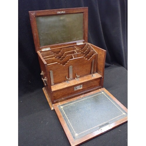 A VICTORIAN OAK STATIONERY BOX (in need of complete restorat...