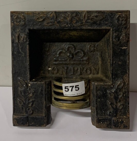 A Victorian cast iron and brass miniature sample fireplace for J.C Honiton, 19.5 x 19cm.