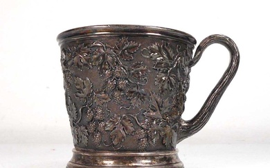 A Victorian silver Christening mug, repousse decorated with vines of...