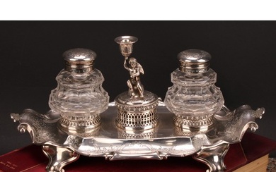 A Victorian silver fluted cartouche shaped inkstand, central...