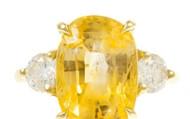 A Yellow Sapphire & Diamond Ring in 18K