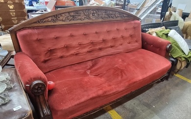 A beautiful antique three seater sofa with a beautifully car...