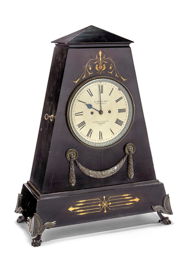 A brass inlaid ebonized and bronze mounted large table clock