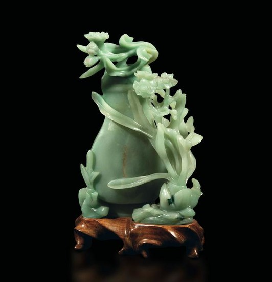 A carved jade vase, China, Qing Dynasty