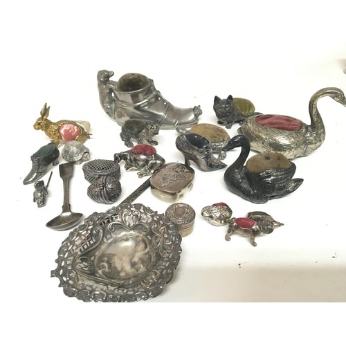 A collection of antique novelty animal and bird pin cushions...