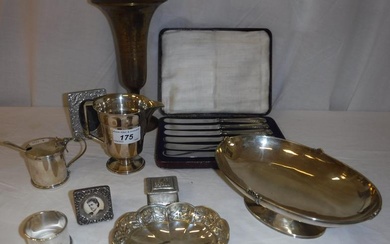 A collection of silver and plated wares to include...