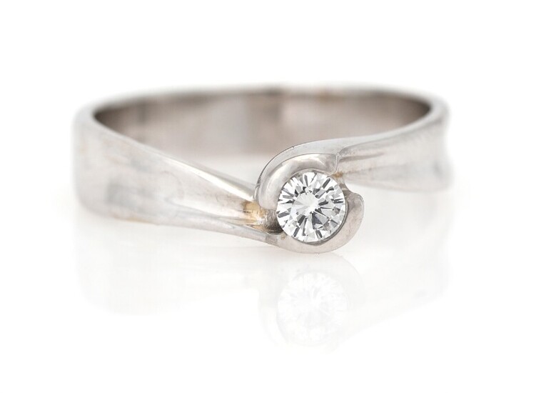 NOT SOLD. A diamond solitaire ring set with a brilliant-cut diamond weighing app. 0.20 ct.,...
