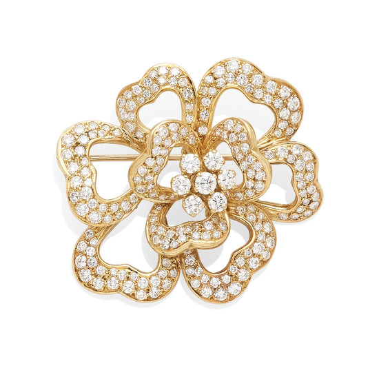 A gold and diamond floral brooch