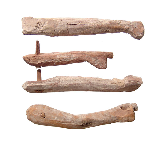 A group of 4 Egyptian wooden boat model elements