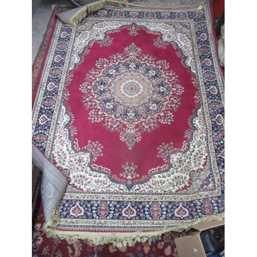 A group of three Middle Eastern woven rugs, two being red gr...