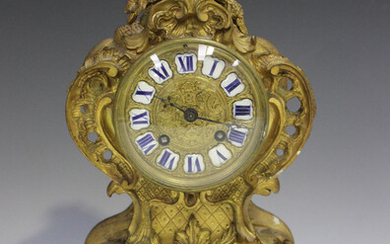 A late 19th century French ormolu cased mantel clock, the eight day movement with silk suspension, s
