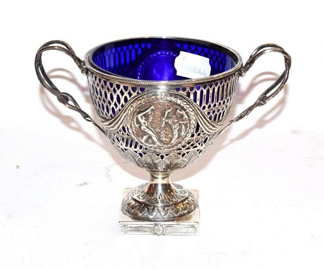 A late Victorian silver twin handled pedestal sugar basket by...