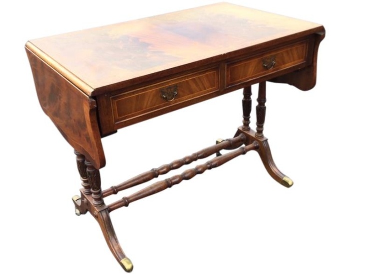 A mahogany sofa table with crossbanded top and two...