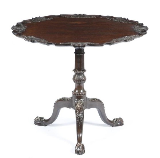 A mahogany tripod table in George II style, the ti…