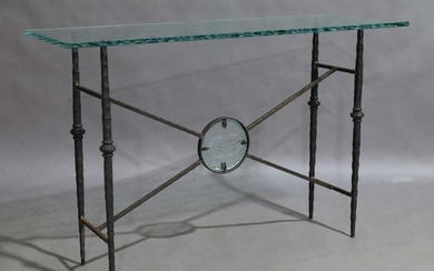 A modern glass top and wrought iron console table, the top etched with Shakespeare quotes, raised on hammered tapering supports joined by X-frame stretcher, 76cm high, 120cm wide, 40cm deep