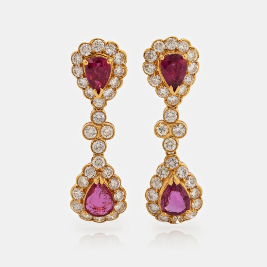 A pair of 18K gold earrings set with faceted rubies and round brilliant-cut diamonds