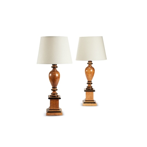 A pair of 20th century faux maple and ebonised table lamps p...