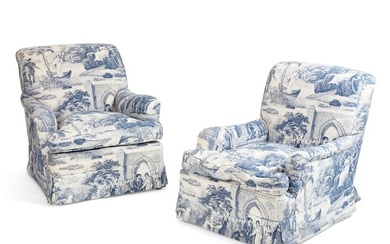 A pair of blue and white upholstered club chairs