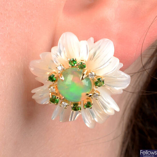 A pair of carved mother-of-pearl, opal, diamond and green garnet floral earrings.