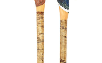 A pair of carved sporting staffs by Mark Richards
