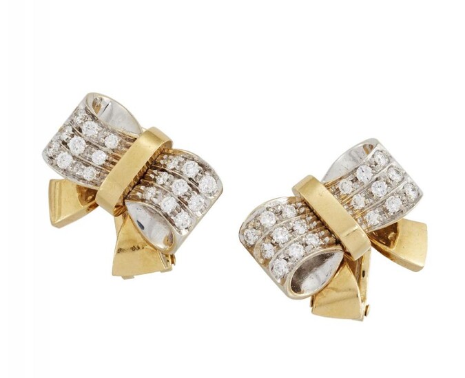 A pair of diamond clip earrings, by...
