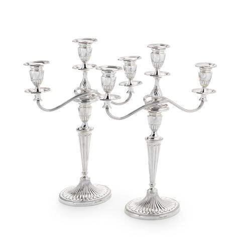 A pair of silver candlesticks with electroplated three-light branches Jenkins & Timm, Sheffield 1894 (2)