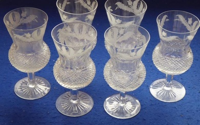 A set of six thistle-shaped wine goblets; finely engraved...