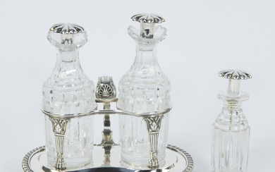 A silver oil and vinegar set with marks and a mustard bottle with spoon, England, London early 19th century