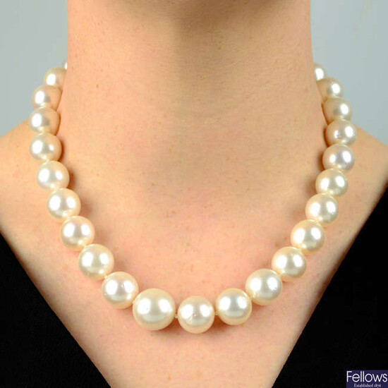 A slightly graduated cultured pearl single-strand necklace, with cultured pearl and circular-cut diamond clasp.