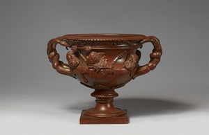 A small cast iron copy of the Warwick vase