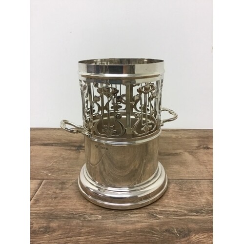 A sterling silver arts and crafts style wine cooler with tur...