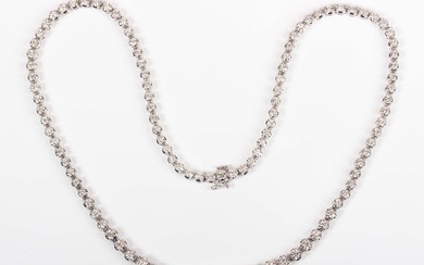 An 18ct white gold and diamond collar necklace, claw set with a row of graduated circular cut diamon