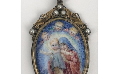 An Arts and Crafts style enamel pendant, decorated Jesus and...