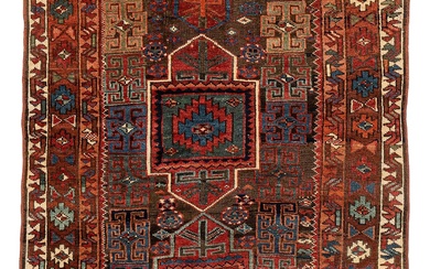 An antique Kurdish / Turkish carpet by the Herki Tribe, ca 276 x 116 cm