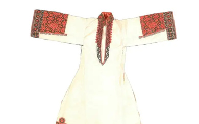 An embroidered robe, Palestine, early 20th century, The hem and cuffs embroidered...