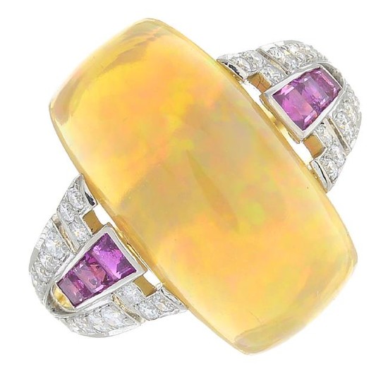 An opal, ruby and diamond dress ring. The rectangular