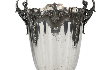 An ornate Italian silver cooler in the shape of a...