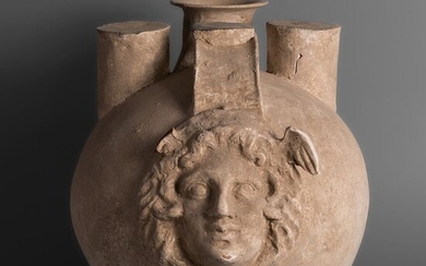 Ancient Greek Pottery Askos with a medus face. 41 cm H.