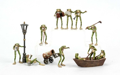 Anthropomorphic group of frogs in