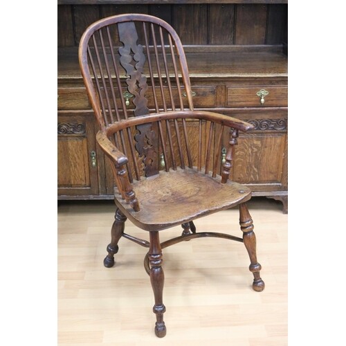 Antique English early 19th century yew and elm elbow chair