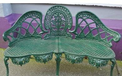 Cast iron garden bench with triple domed back, foliate and h...