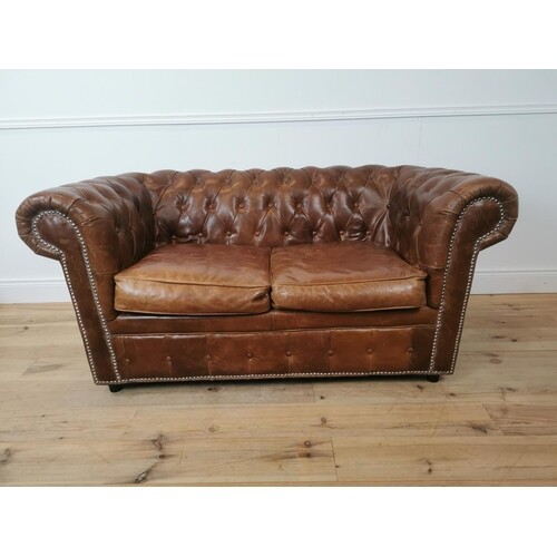 Exceptional quality hand died leather deep buttoned two seat...
