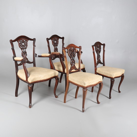 FOUR LATE VICTORIAN MAHOGANY FRAMED CHAIRS IN THE ROCOCCO STYLE.